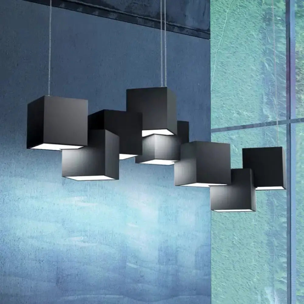 Modern black cube pendant led island light with illuminated interiors in a geometric arrangement for kitchen or living room