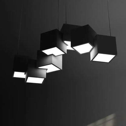 Black geometric led island light with illuminated square faces for modern kitchen or living room island lighting
