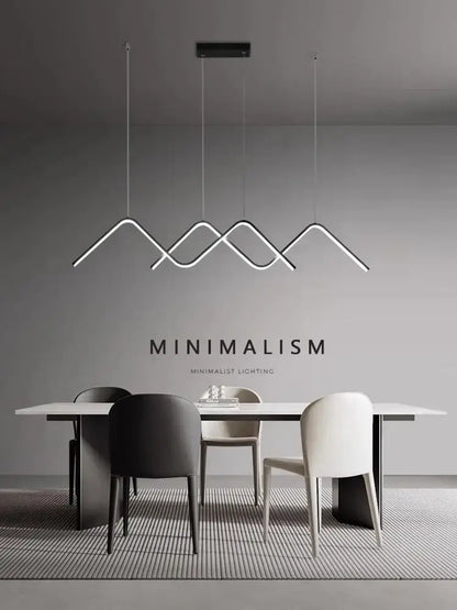 Modern white geometric led pendant light with sleek angular mountain-inspired design for dining room decorbites pendant lights