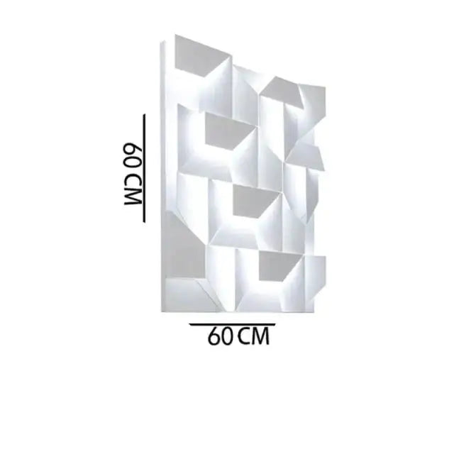 Modern white geometric wall lamp with faceted 3d design illuminating a living room as decorative art panel