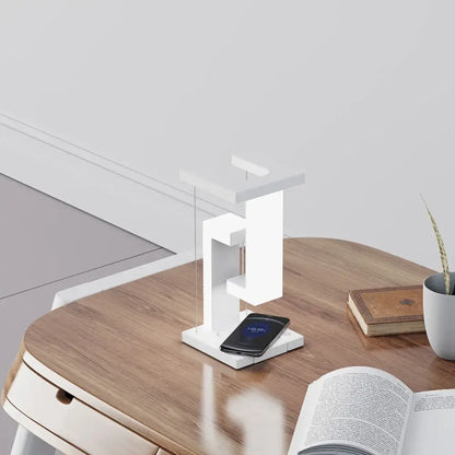 Modern white geometric wireless charger desk lamp with sleek minimalist design and vertical charging slot for bedroom use