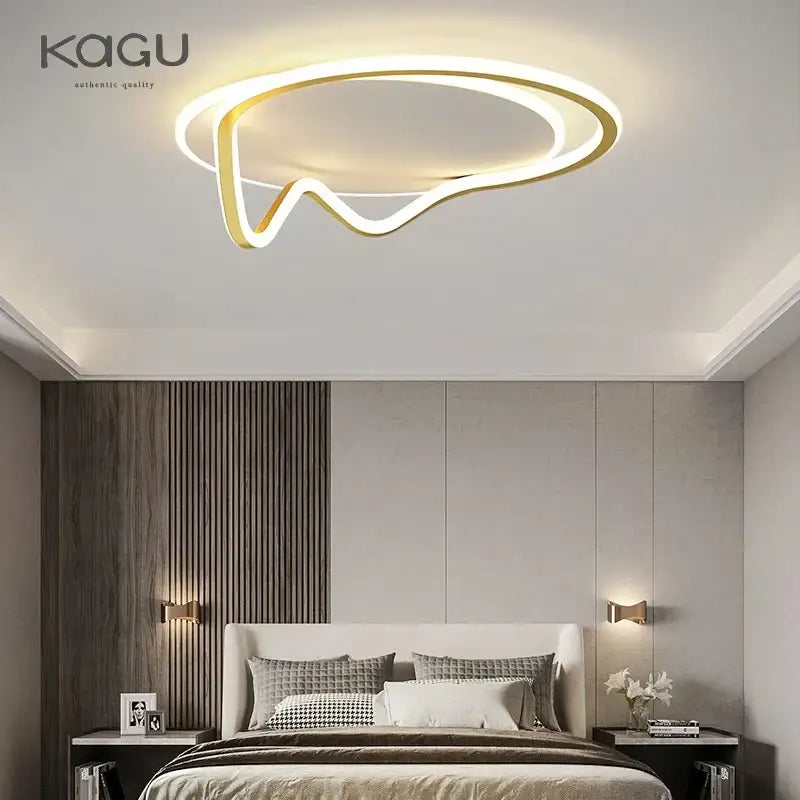 Modern white geometry round led ceiling light with gold-toned abstract ring design and warm ambient glow by decorbites geometry round