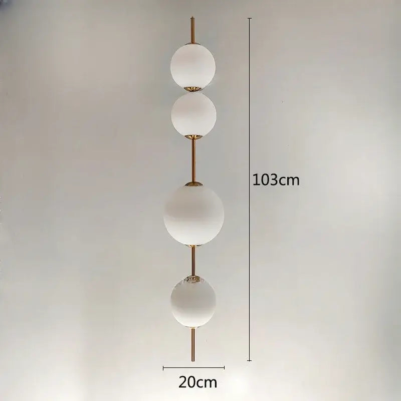 Modern white glass ball led pendant light with four frosted spherical shades and brass rods for kitchen and dining room decorbites glass ball