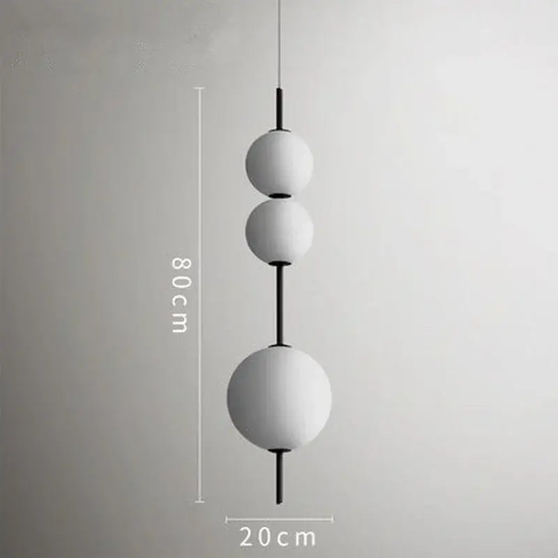 Modern white glass ball led pendant light with three matte white glass globes and black rods for kitchen and dining decorbites glass ball