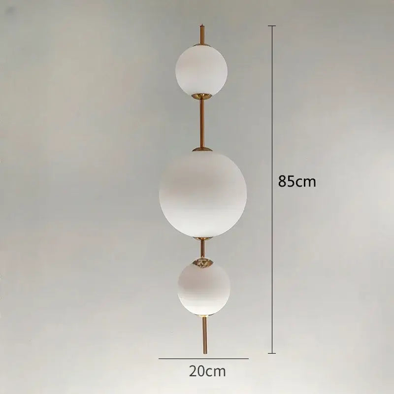 Modern white glass ball led pendant light with frosted spherical shades and brass rods, 85cm height for kitchen and dining room decorbites glass ball