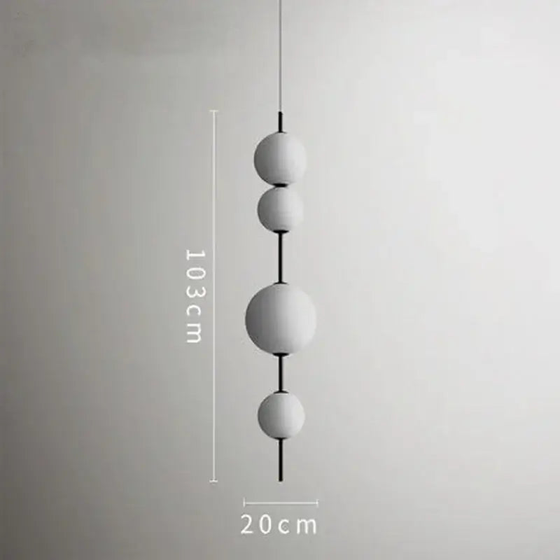 Minimalist modern white glass ball led pendant light with matte finish and black connectors for kitchen and dining room decorbites glass ball