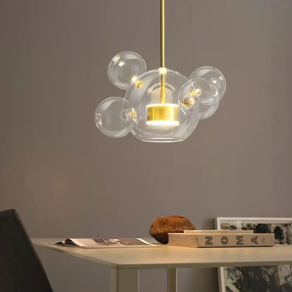 Modern white glass bubble chandelier with gold-toned metal stem pendant light for living room decorbites glass bubble design