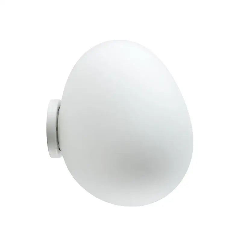 Modern white glass egg wall lamp with frosted egg-shaped glass and sleek metallic mounting bracket for bedroom use
