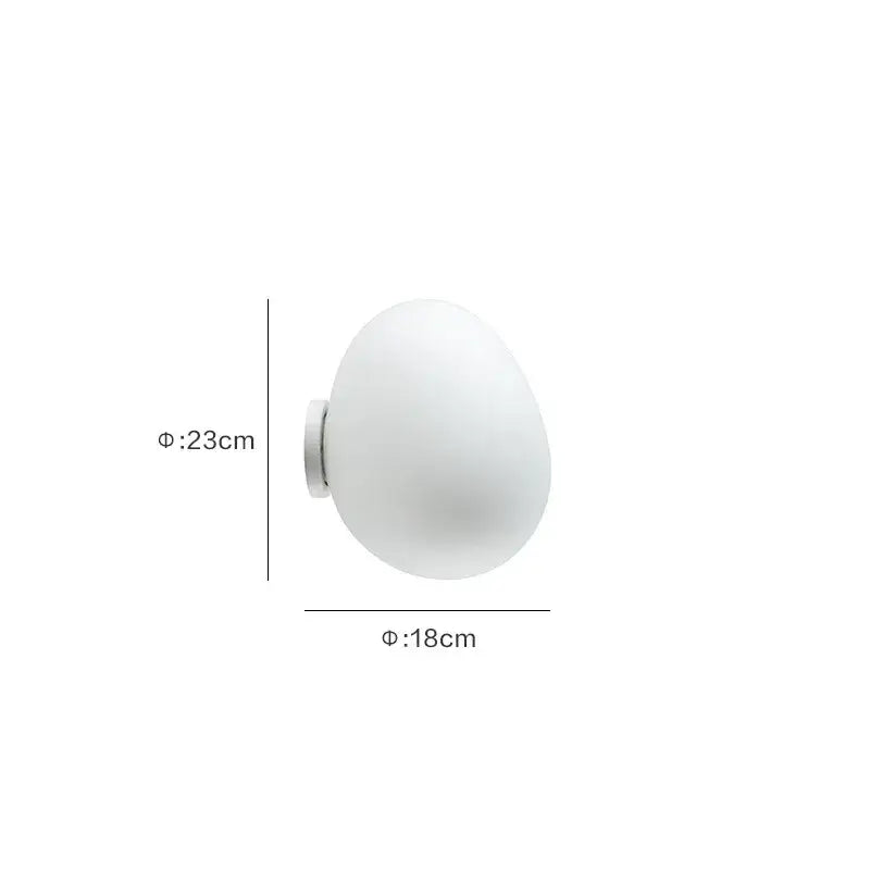 Modern white glass egg wall lamp with frosted globe and metallic base for bedroom wall sconces installation