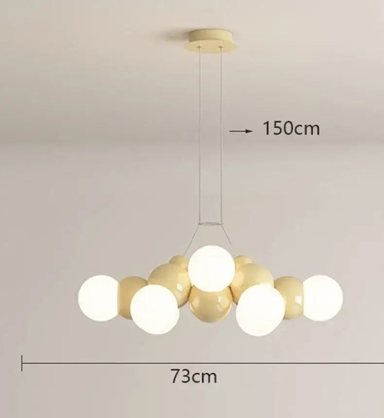 Modern white glass globe pendant light fixture with glossy cream and white spherical bulbs for dining room use