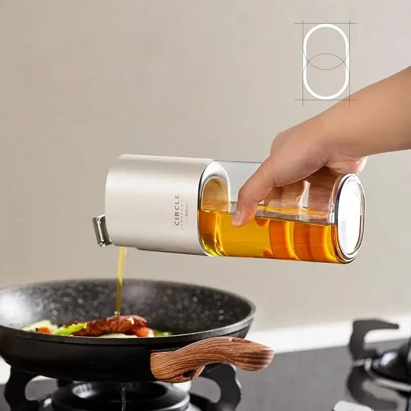 Modern white glass oil pot set featuring a silver and clear glass oil dispenser with a sleek seasoning bottle design