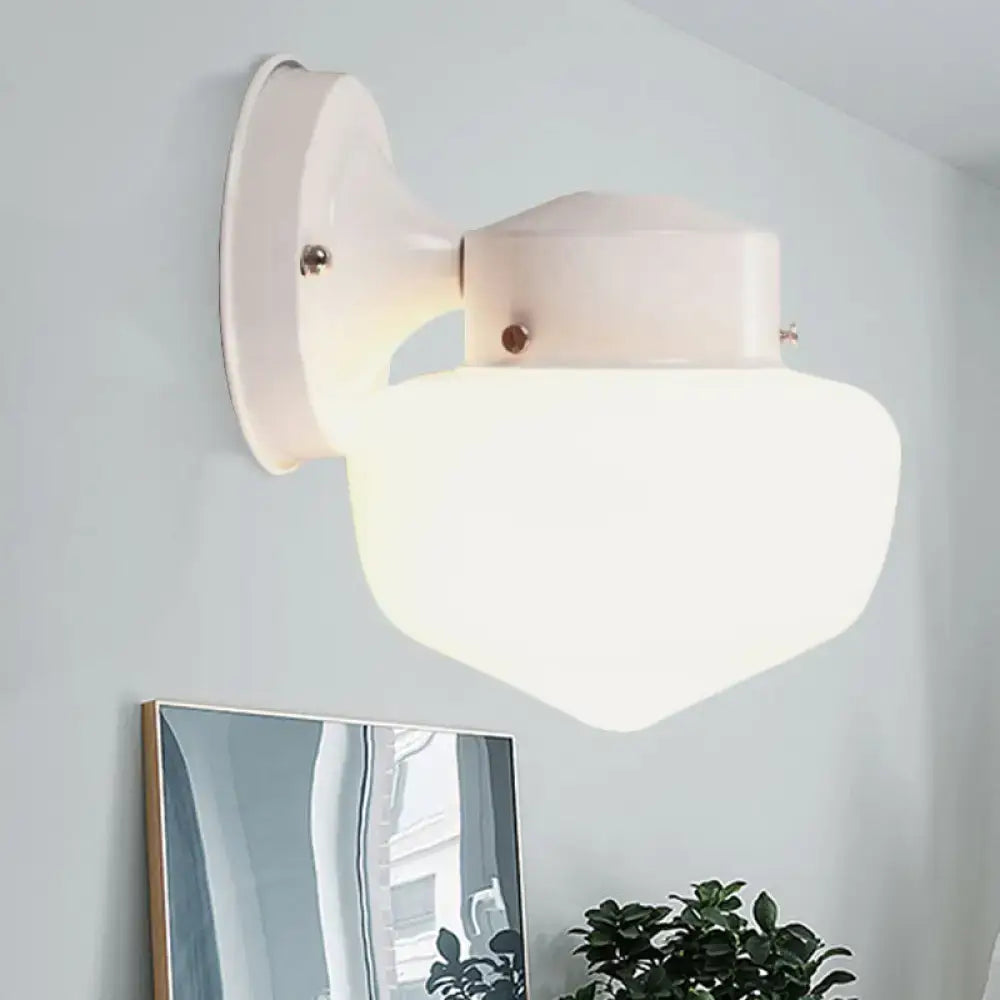 Modern white glass sconce light with frosted glass shade and metal bracket for bedroom black white mirror decor