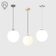 Modern White Globe Glass Pendant Light in Gold, Black, or Silver - Decorbites