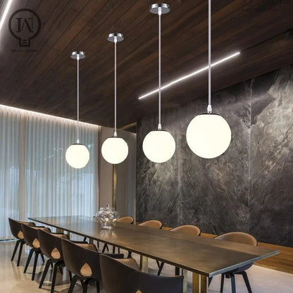 Modern White Globe Glass Pendant Light in Gold, Black, or Silver - Decorbites