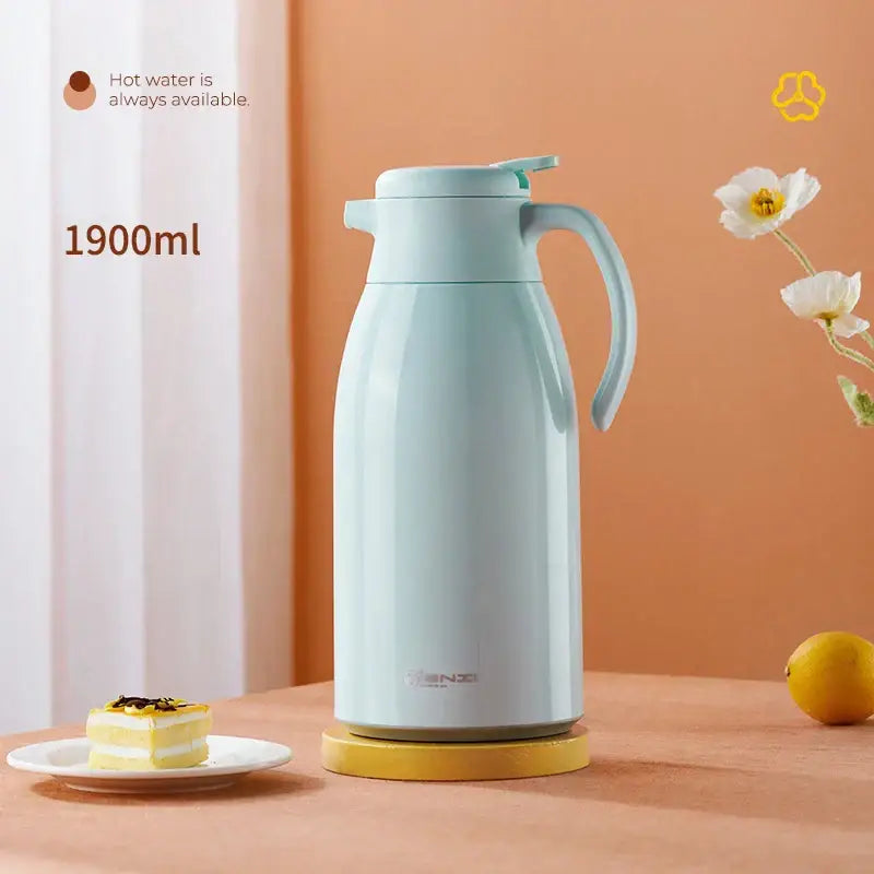 A sleek light blue 1900ml decorbites glass insulation kettle with handle and lid for modern kitchen use