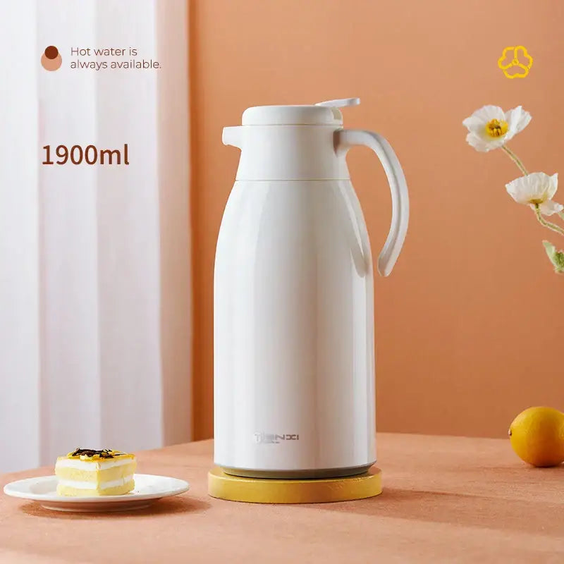 Modern white glossy glass insulation kettle thermos bottle with 1900ml capacity and sturdy handle by decorbites glass insulation