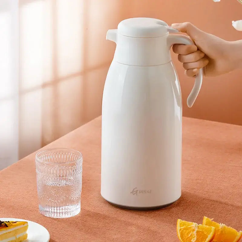 Modern white glossy glass insulation kettle with ergonomic handle from decorbites glass insulation collection