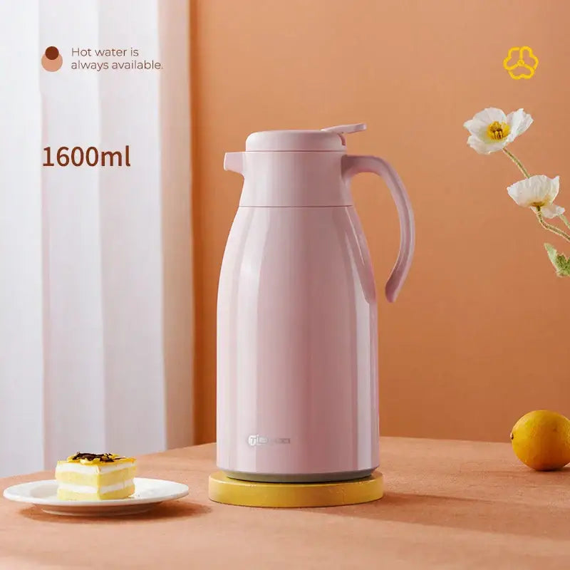 A sleek pastel pink 1600ml decorbites glass insulation kettle with matte finish and ergonomic handle