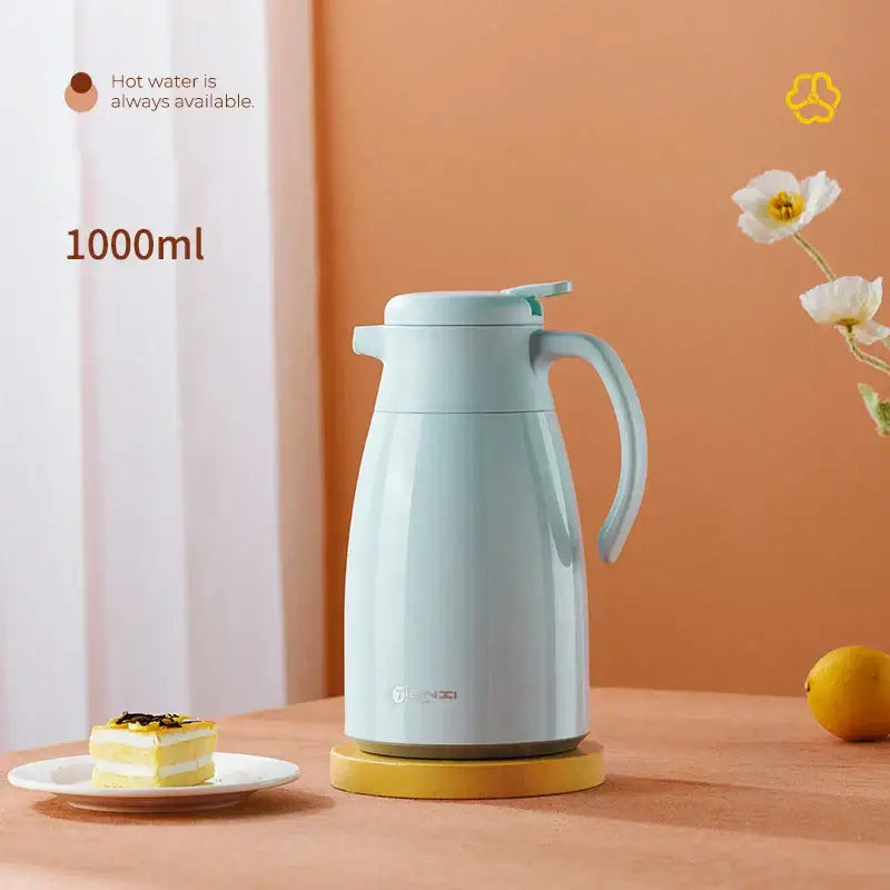 A sleek light blue 1000ml decorbites glass insulation kettle with matching lid and handle for modern kitchen use