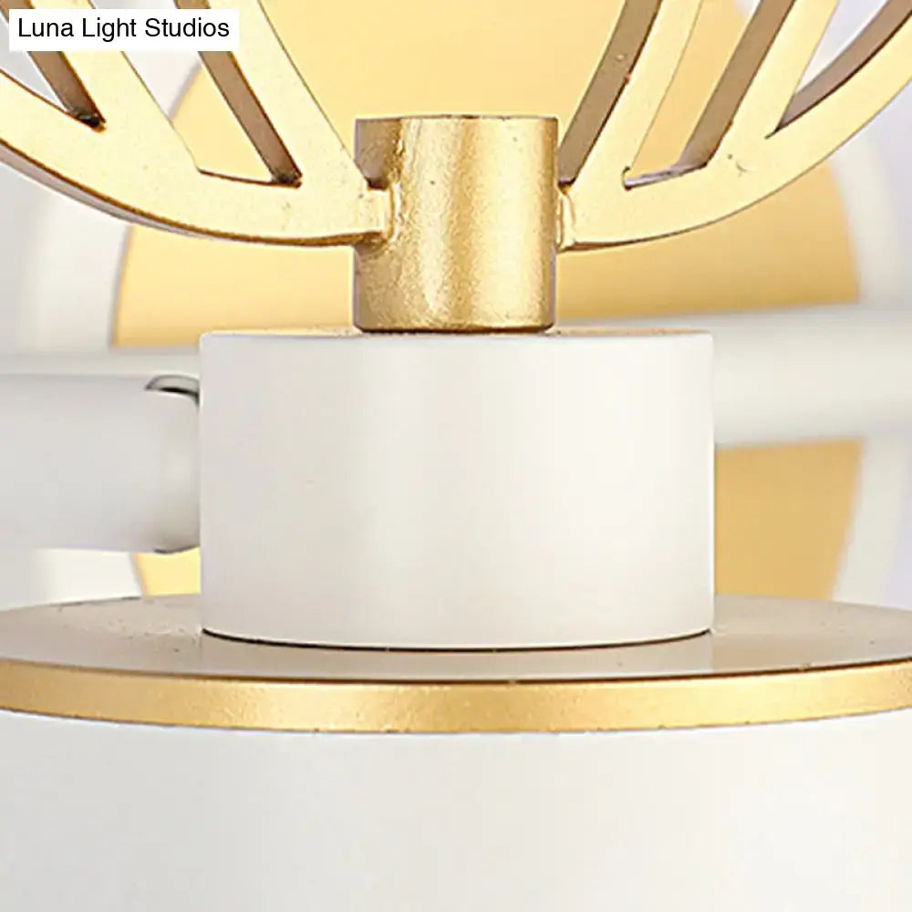 Modern white and gold antler wall light fixture with geometric fan-like metal arms for bathroom vanity use