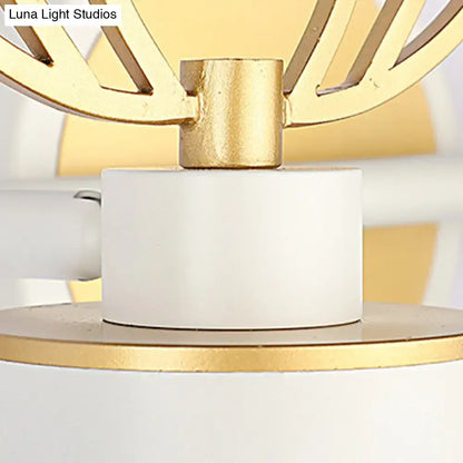 Modern white and gold antler wall light fixture with geometric fan-like metal arms for bathroom vanity use