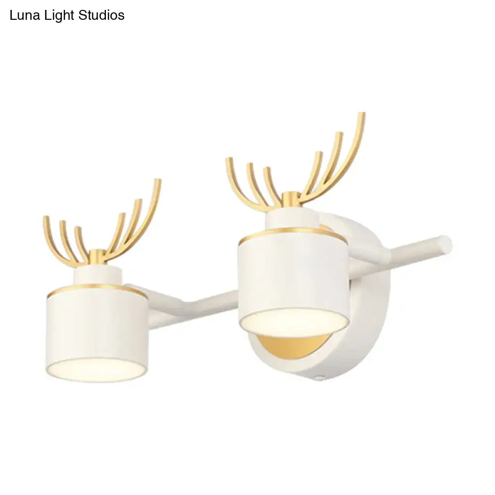 Modern white and gold antler wall light fixture with cylindrical shades for bathroom vanity LED lighting