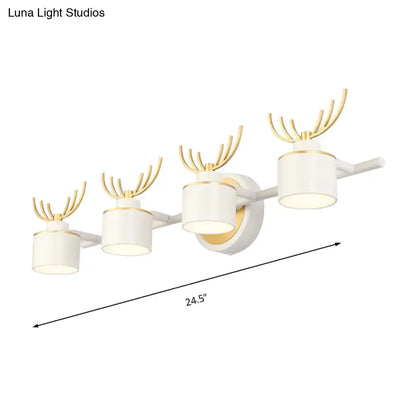 Modern white and gold deer-themed wall light fixture with four cylindrical shades for natural light in bathroom vanity