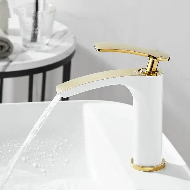 Modern white and gold ceramic brass bathroom basin faucet with gold-accented sleek design decorbites brass bathroom