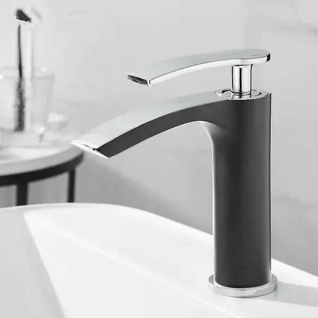 Modern black and chrome basin faucet with sleek curved spout for decorbites brass bathroom basin use