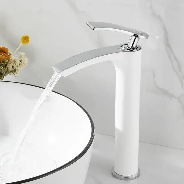 Modern white and gold ceramic brass bathroom basin faucet with a chrome-finished waterfall basin faucet by decorbites brass bathroom