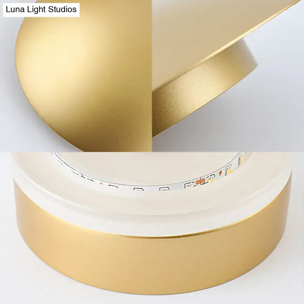 Modern white and gold wall light with warm white led and sleek curved gold-finished table lamp design