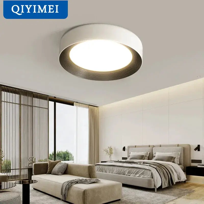 Modern decorbites circular chandelier light featuring a white outer ring and dark metallic inner rim by qiyimei