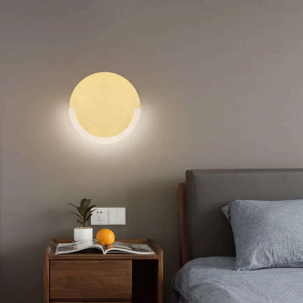 Modern white and gold round acrylic wall sconce with warm white light and sleek white rim for 220v-240v or 110v-120v use