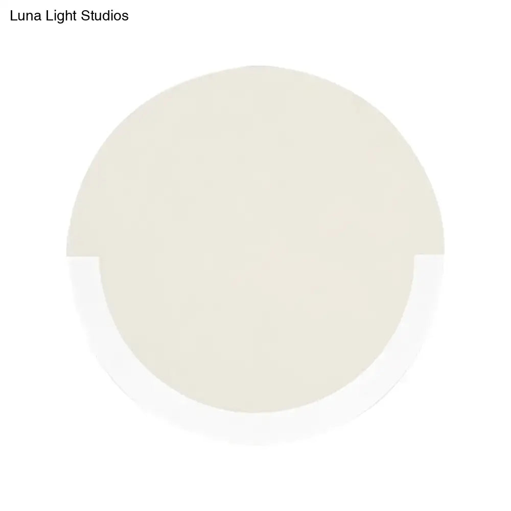 A soft creamy off-white round acrylic paint swatch from luna light studios for warm white light 220v-240v 110v-120v use
