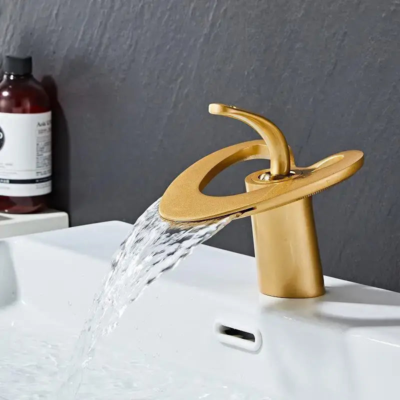 Modern white and gold basin faucet with black brass waterfall design and brushed metallic finish by decorbites golden white