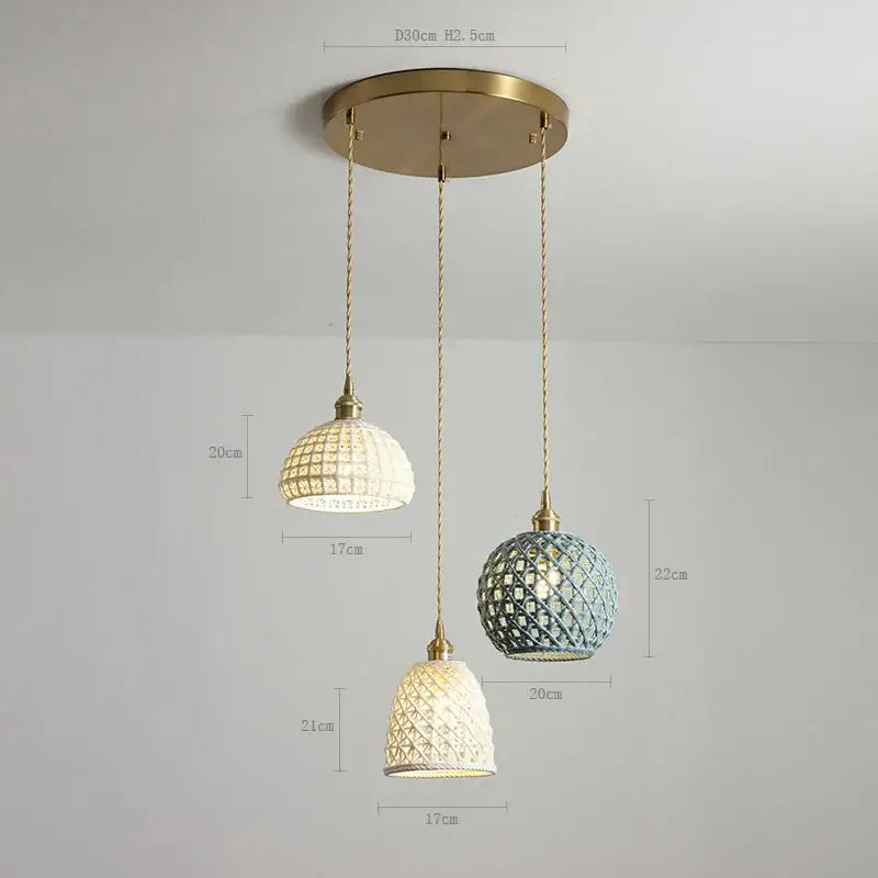 Modern white and gray geometric ceramic led pendant lights with brass fixtures and twisted cords for dining room decorbites ceramic led