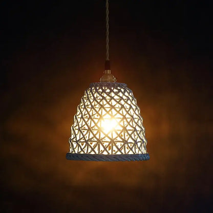 Modern white ceramic led pendant with geometric lattice design and rope base for dining room decorbites ceramic led lighting