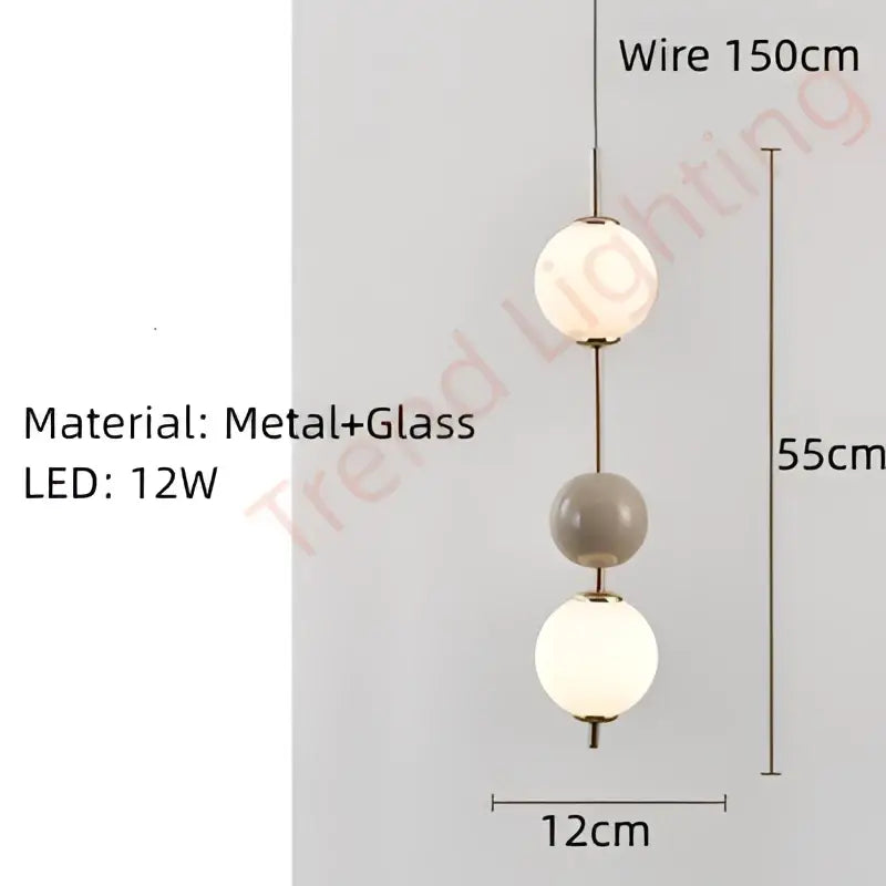 A modern three-tiered pendant light with white and gray glass globes suspended by a 150cm metal wire for dining room decorbites colorful ball led