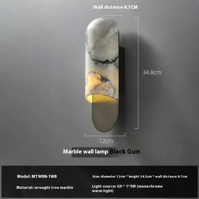 A modern white and gray marble led wall lamp with a black iron base illuminating warm light for the living room