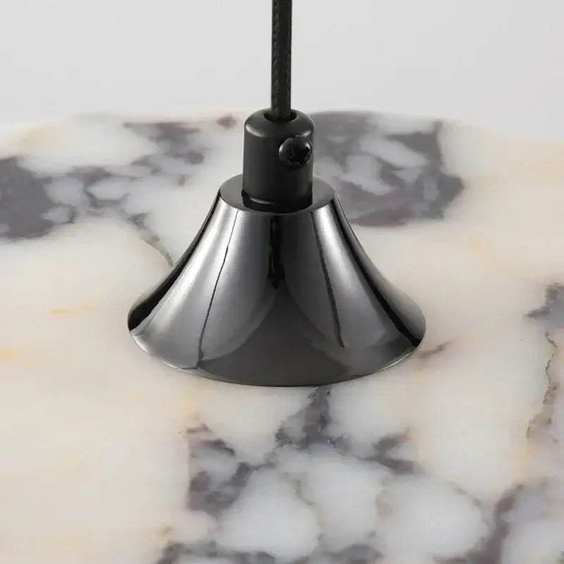 Black matte metal pendant light base with sleek flared design for modern white and gray marble decorbites 3d printed ball led