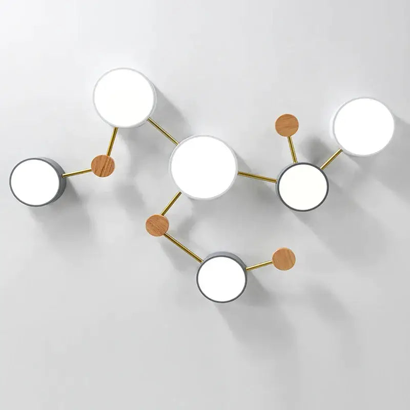 Modern white and gray wood ceiling chandelier with circular luminous panels and gold metal arms for living room lighting