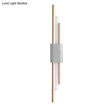 Modern white and green marble wall lamp featuring gold-toned rods and matte gray accent, energy efficient and cost effective