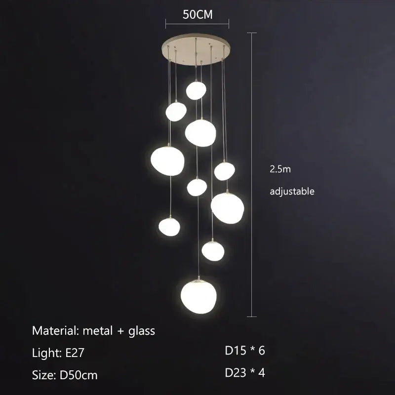 Modern white gregg glass suspension pendant light with spherical design and adjustable hanging length for villa staircase decor