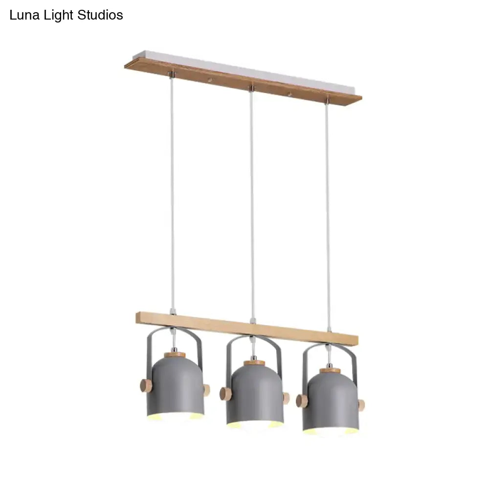 Modern grey dome shade pendant light with wooden accents and three hanging lampshades by DecorBites™