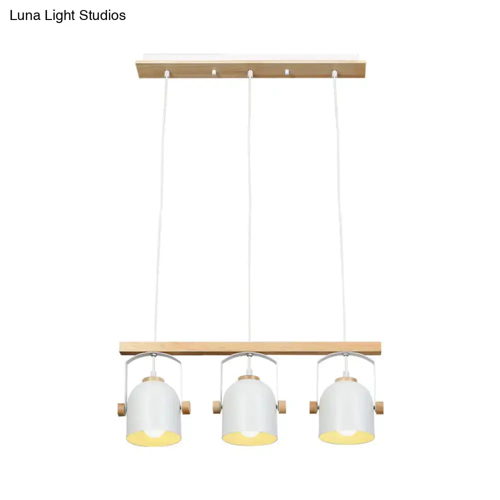 Modern white and grey dome shade chandelier with wooden accents featuring three hanging dome shade lampshades