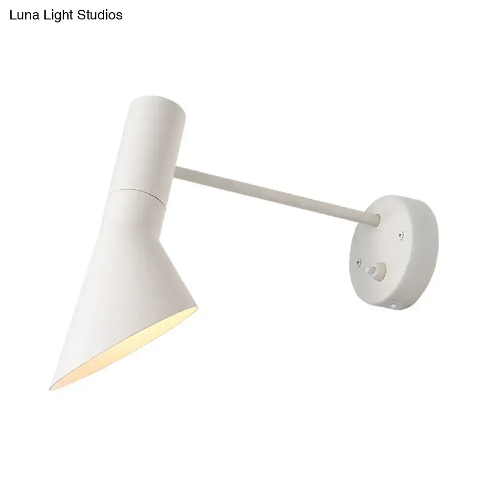 White minimalist wall-mounted reading lamp with a sleek conical shade and adjustable arm in white grey rotating node design