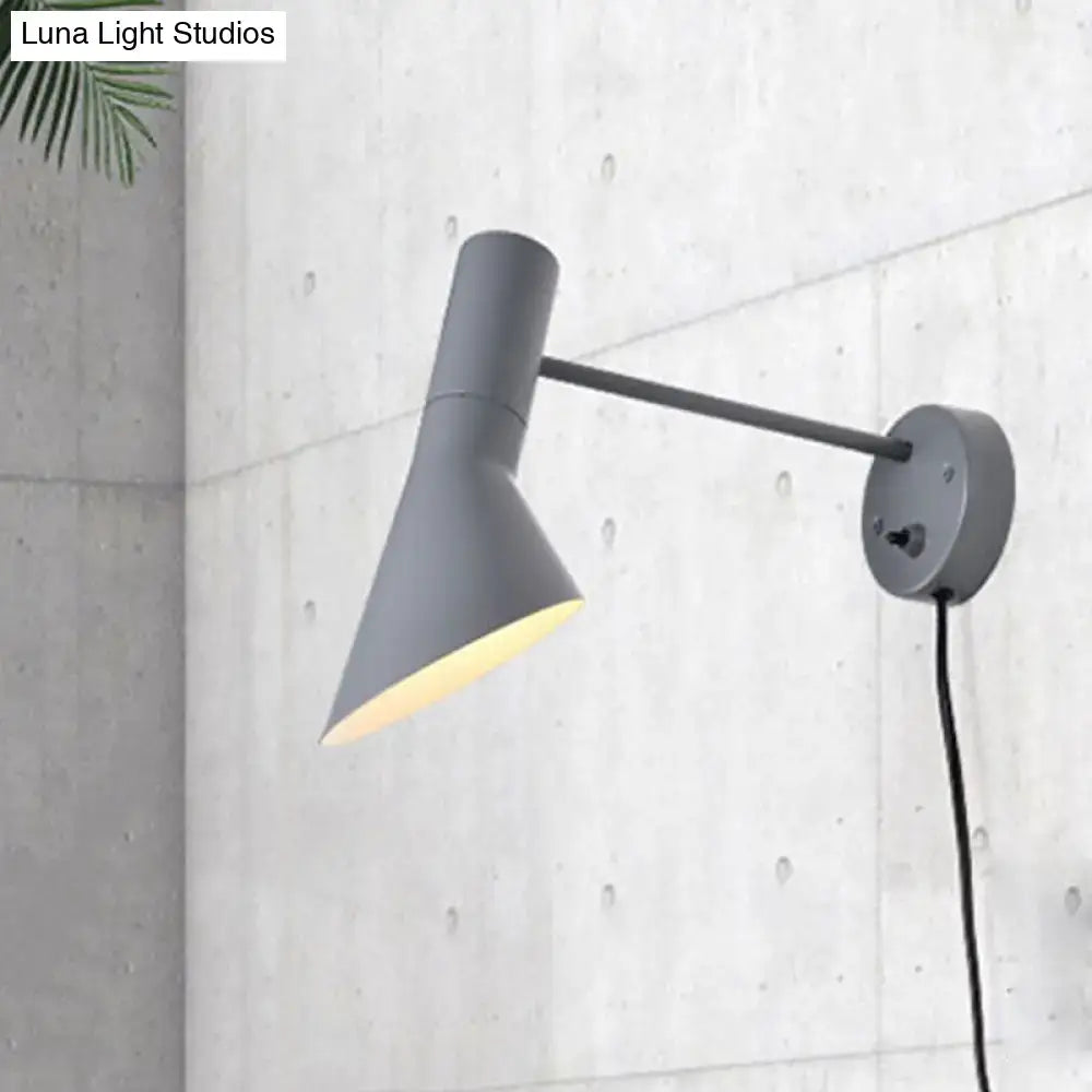 Gray matte-finished wall-mounted lamp with sleek adjustable arm in white grey rotating node design for bedroom lighting