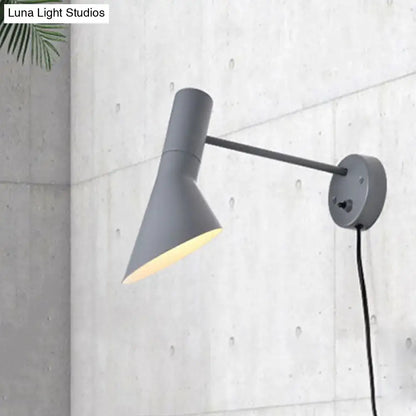 Gray matte-finished wall-mounted lamp with sleek adjustable arm in white grey rotating node design for bedroom lighting