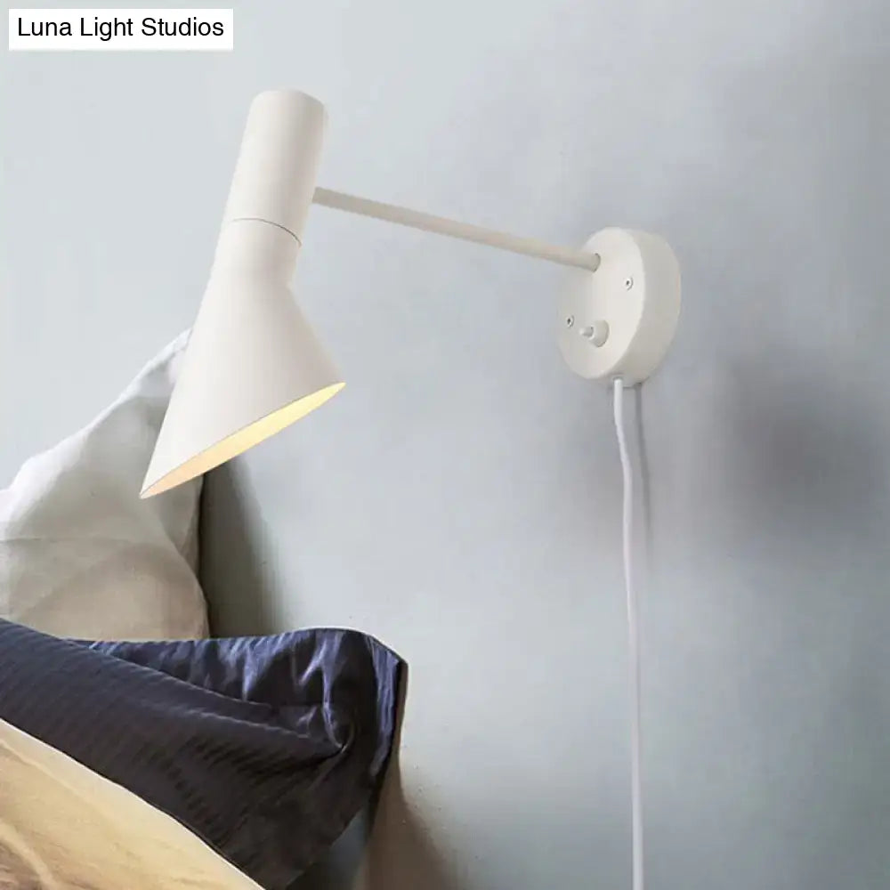 Modern white and grey rotating node wall sconce with a sleek minimalist design and adjustable arm for bedroom lighting