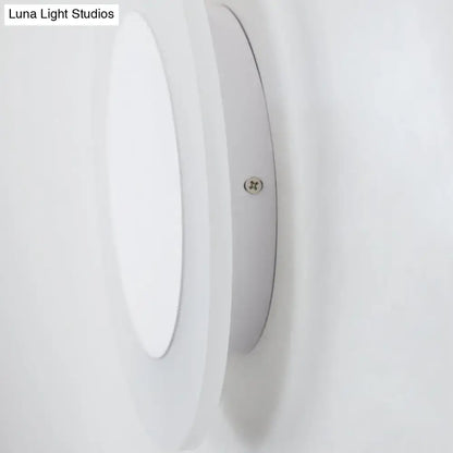 Modern white halo ring wall lighting fixture featuring a sleek circular recessed ceiling light for bedroom wall lighting